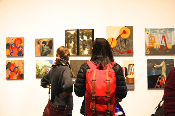 Students viewing artwork